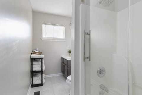 Combined shower/tub, hair dryer, towels, soap