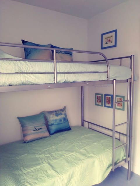 Bedroom two with twin bunk beds.