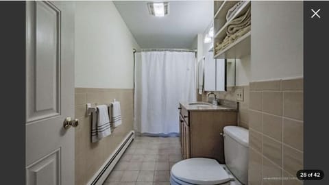 Combined shower/tub, towels, soap, toilet paper