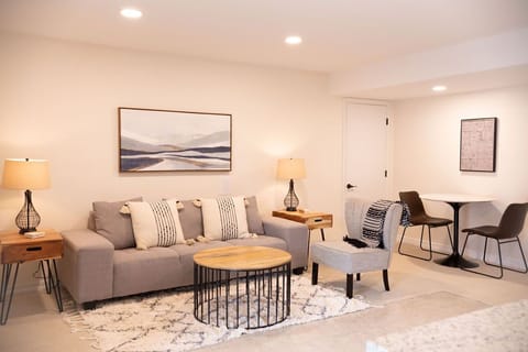 Spacious & stunning open concept living room, dining area and kitchnette. 