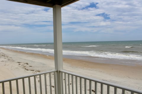 On the beach, sun loungers, beach towels