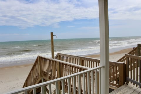 On the beach, sun loungers, beach towels