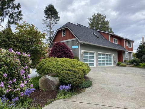 front side of the house with attached 3 car garage. 