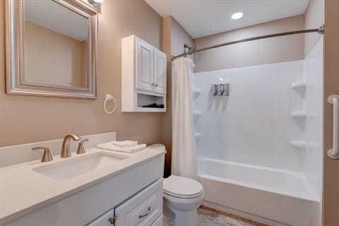 Combined shower/tub, hair dryer, towels, soap