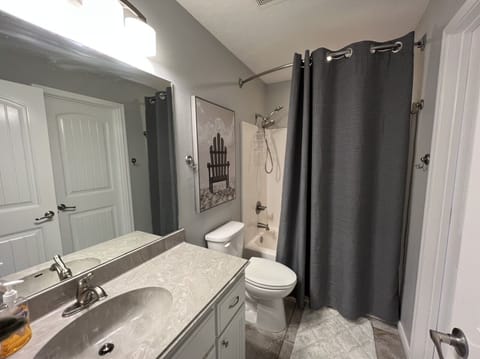 Combined shower/tub