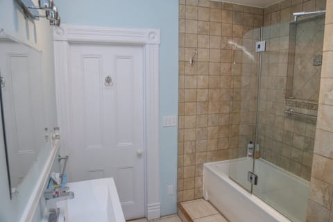 Combined shower/tub, soap