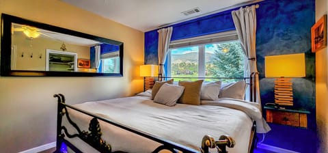 Premium king bed with luxe sheets & pillows, plus a stunning private window view