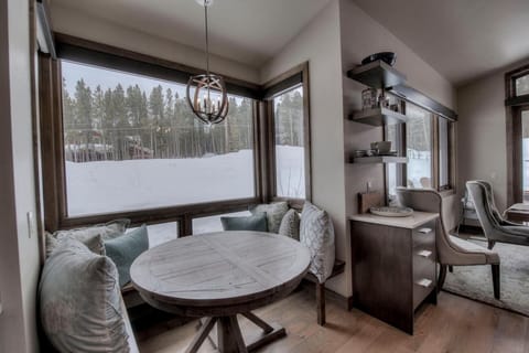 Breakfast nook with picture frame windows