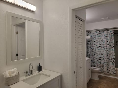 Combined shower/tub, hair dryer, towels, soap