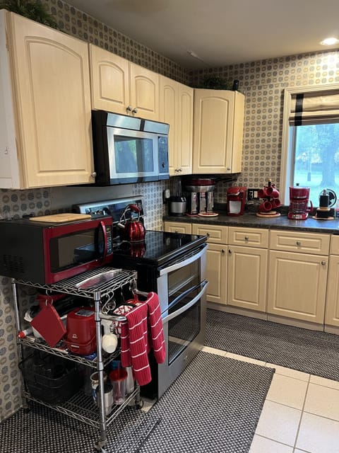 Featuring a Keurig, regular coffee pot and tea kettle