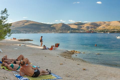 Beach nearby, sun loungers