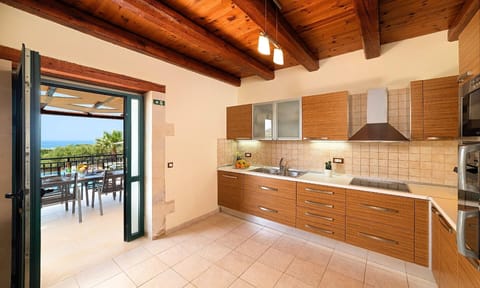 Kitchen area. Villa Stelios | HotelPraxis Group