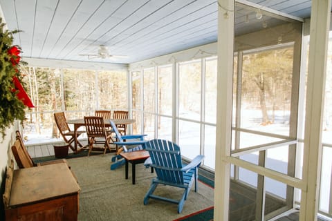 Screen Porch overlooking pond - coffee, cocktails and dining
