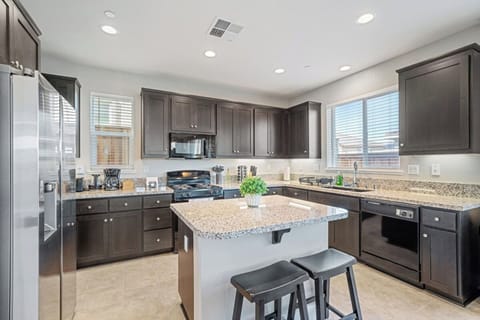 A kitchen island for extra cooking or an eating surface.