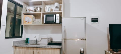 Fridge, microwave, coffee/tea maker, electric kettle