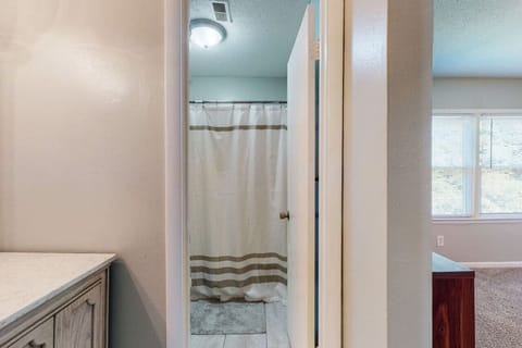 Combined shower/tub, hair dryer, towels, soap