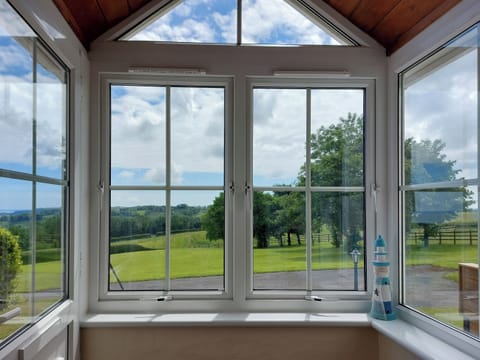 View over garden | Sea View - Coastal Cottages, Saundersfoot