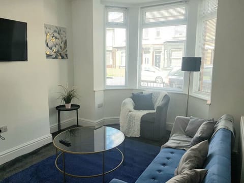 Living room with sofa bed and bathroom