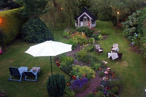 Back garden with path to summerhouse