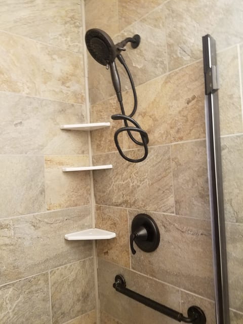 Shower, hair dryer, heated floors, towels