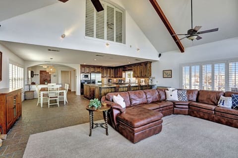Open space living room and tons of windows allows everyone to enjoy the company and the views together.