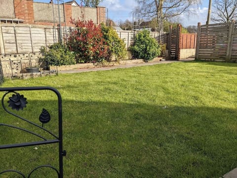 The garden is enclosed with a gate and lock on the inside for your privacy. The lawn area is a safe space to play.