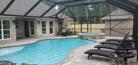 Private pool & Spa with screen enclosure.