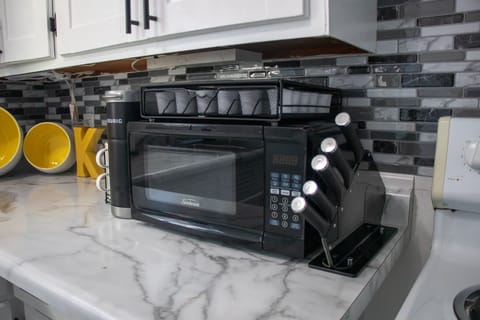 Microwave, coffee/tea maker, cookware/dishes/utensils