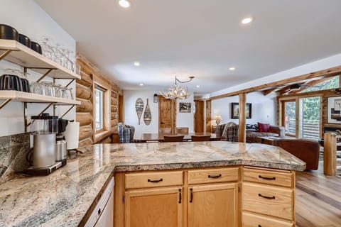 This all equipped kitchen allows you to cook and still be apart of the party.