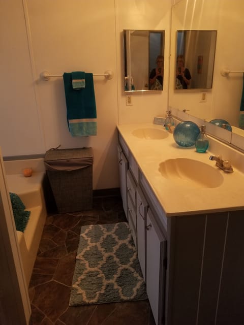 Combined shower/tub, hair dryer, towels, soap