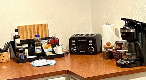 Coffee pot, we supply coffee cream and sugar. Tea kettle and a selection of teas