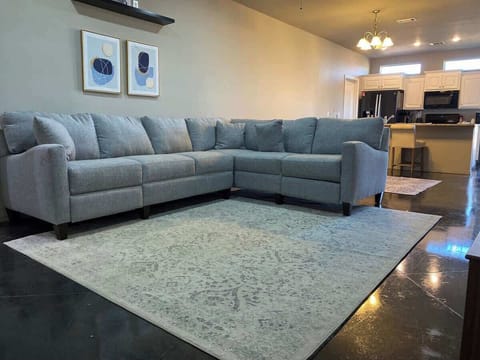 Large comfortable sectional with one side that reclines, comfortable for the whole family!