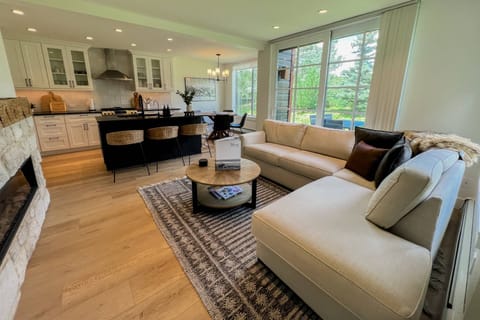 Inviting open concept kitchen, living and dining room