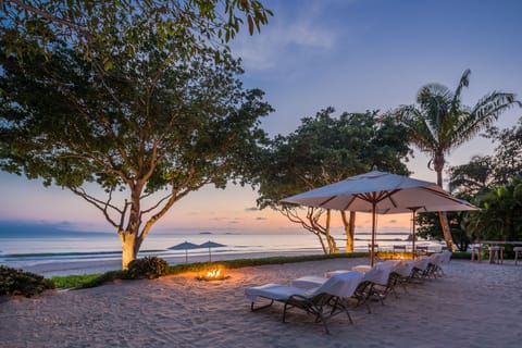 On the beach, sun loungers, beach towels