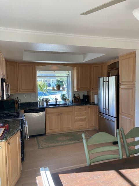 Kitchen with stainless steel and gas cooktop