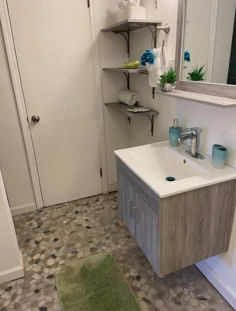 Combined shower/tub, hair dryer, towels, soap