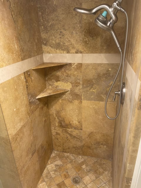 Combined shower/tub