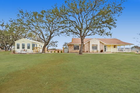 The Cottage sits to the left of the main house on the property.