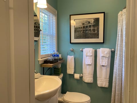 Combined shower/tub, hair dryer, towels, soap