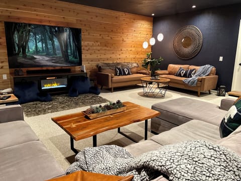 Spacious den with 85” TV