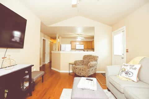 Living area looks into kitchen/dining area