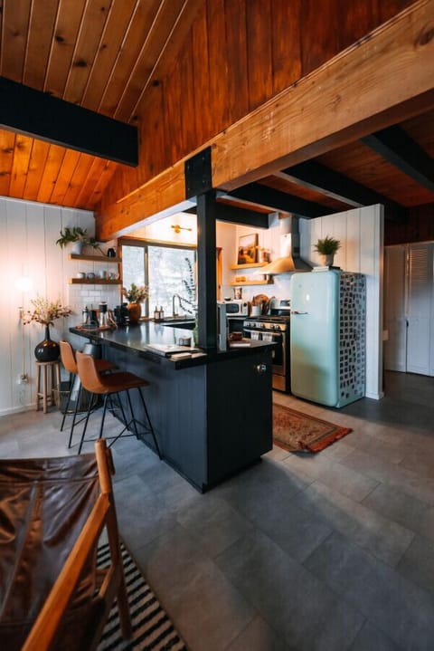 All the essentials in this fully stocked kitchen with Smeg refrigerator
