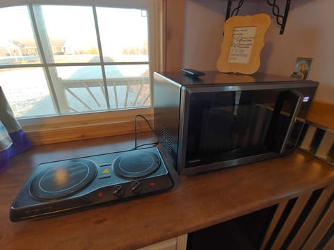 Fridge, microwave, stovetop, coffee/tea maker