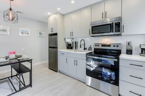 Modern kitchen appliances include a dual element stove top