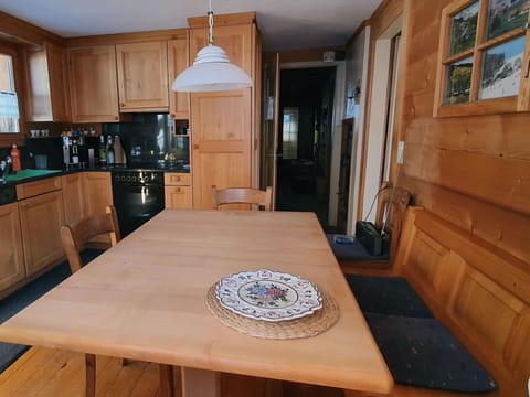 Furniture, Property, Cabinetry, Wood, Table, Lighting, Interior Design, Architecture, Floor, Picture Frame