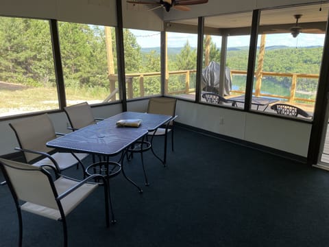 16x16 screened in porch with access to full length lakeside deck. 