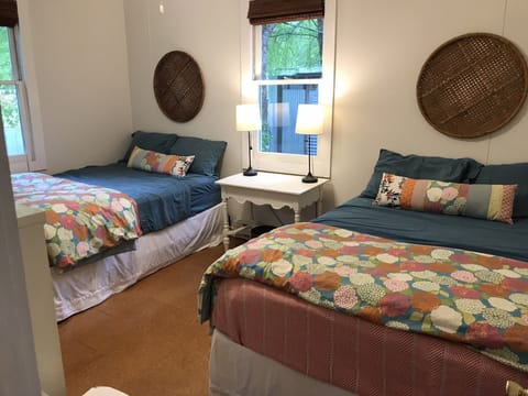Second cottage bedroom with 2 full size beds 