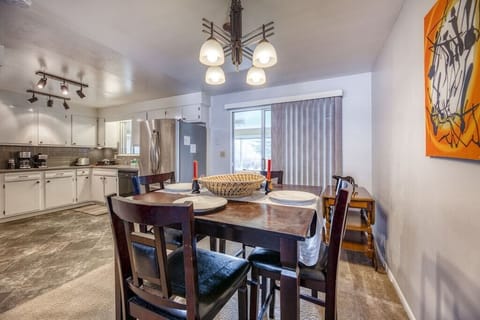 Dinning room and kitchen.  Enjoy a home-cooked meal in this beautiful dining space that sits 4.