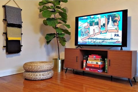 Side B: Enjoy some TV time on the 55" Roku with access to Netflix, Hulu, etc.
