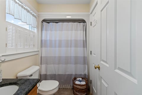 Combined shower/tub, hair dryer, towels, soap